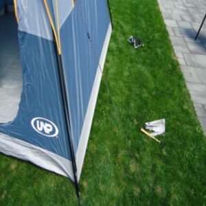 string of tent canopy insert into ground