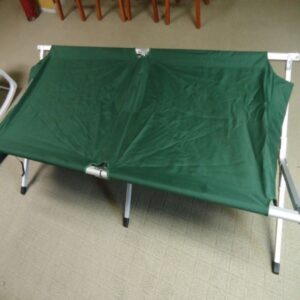 open green cot for sleeping