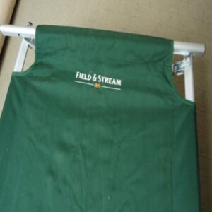 close up of top half of green cot with field stream logo