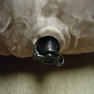 close up of sealed valve on inflated air mattress